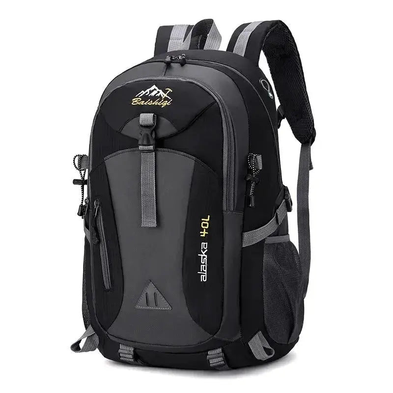 Hiker on a trail wearing a 40L waterproof backpack