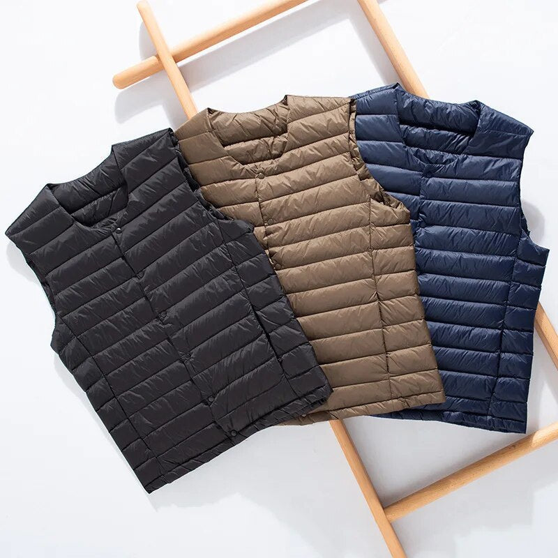 Front view of the men's down vest in a classic solid color.