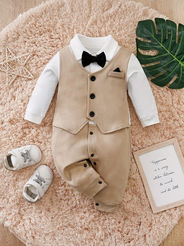 Baby tuxedo romper with printed vest and sewn on bow tie