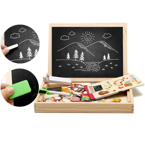 Child drawing on the magnetic side of the wooden board