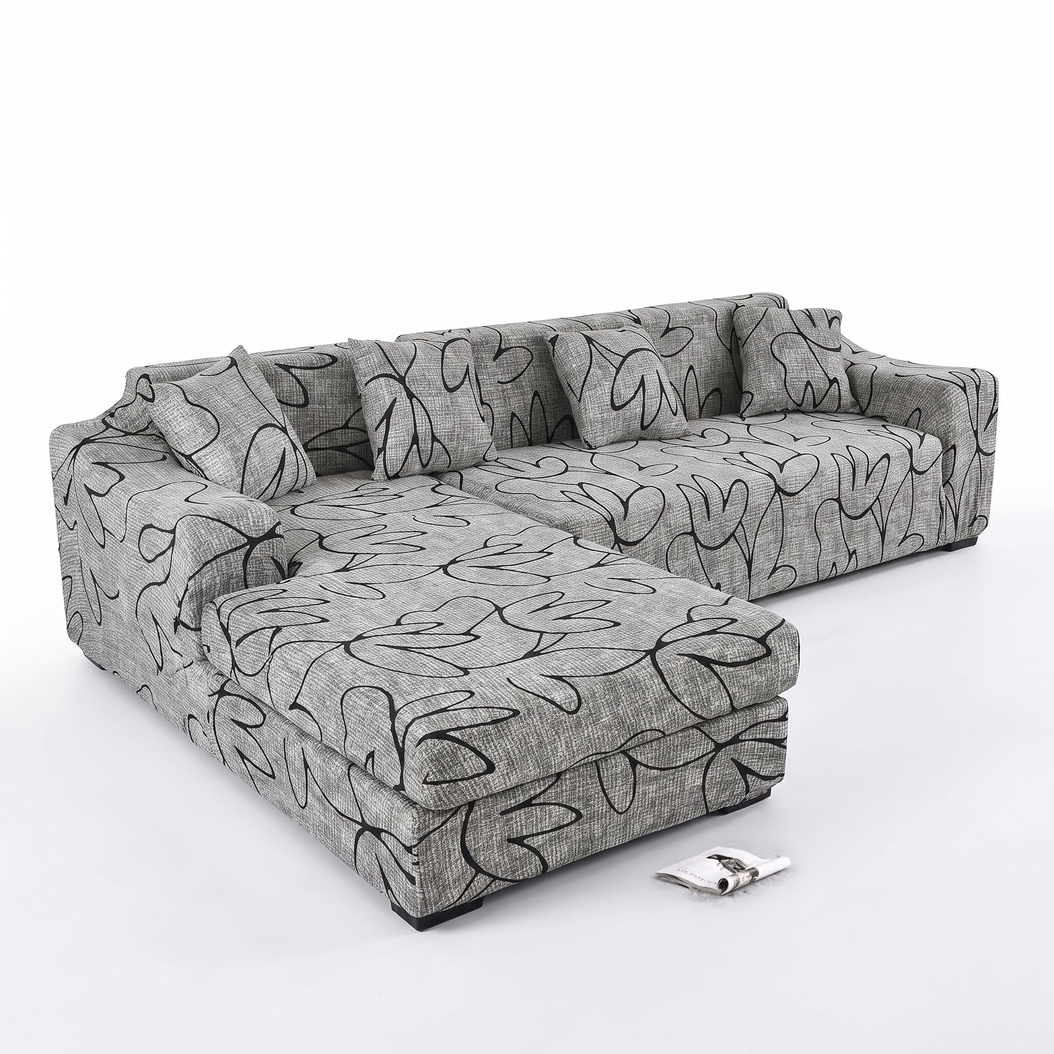Stretch Sectional Couch Cover – Grey Line Art Floral Print – product photo on a white background | Brivenzo