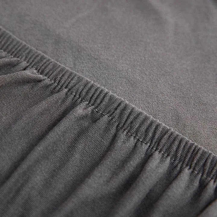 Stretch Sofa Slipcover – Anthracite Grey – product view 10 | Brivenzo