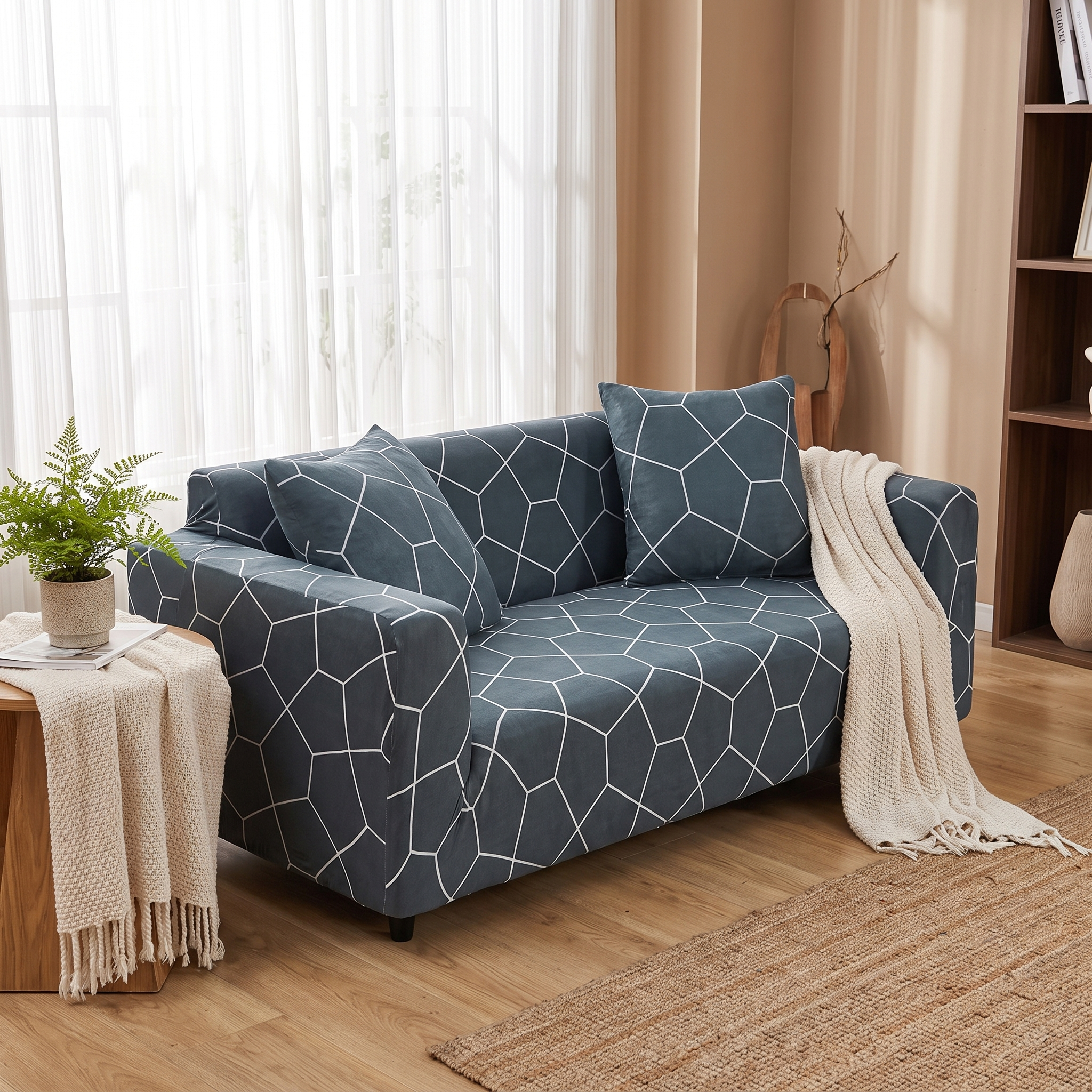 Stretch Sofa Slipcover – Charcoal Blue Geometric Crystal Print shown in a styled home interior | Brivenzo