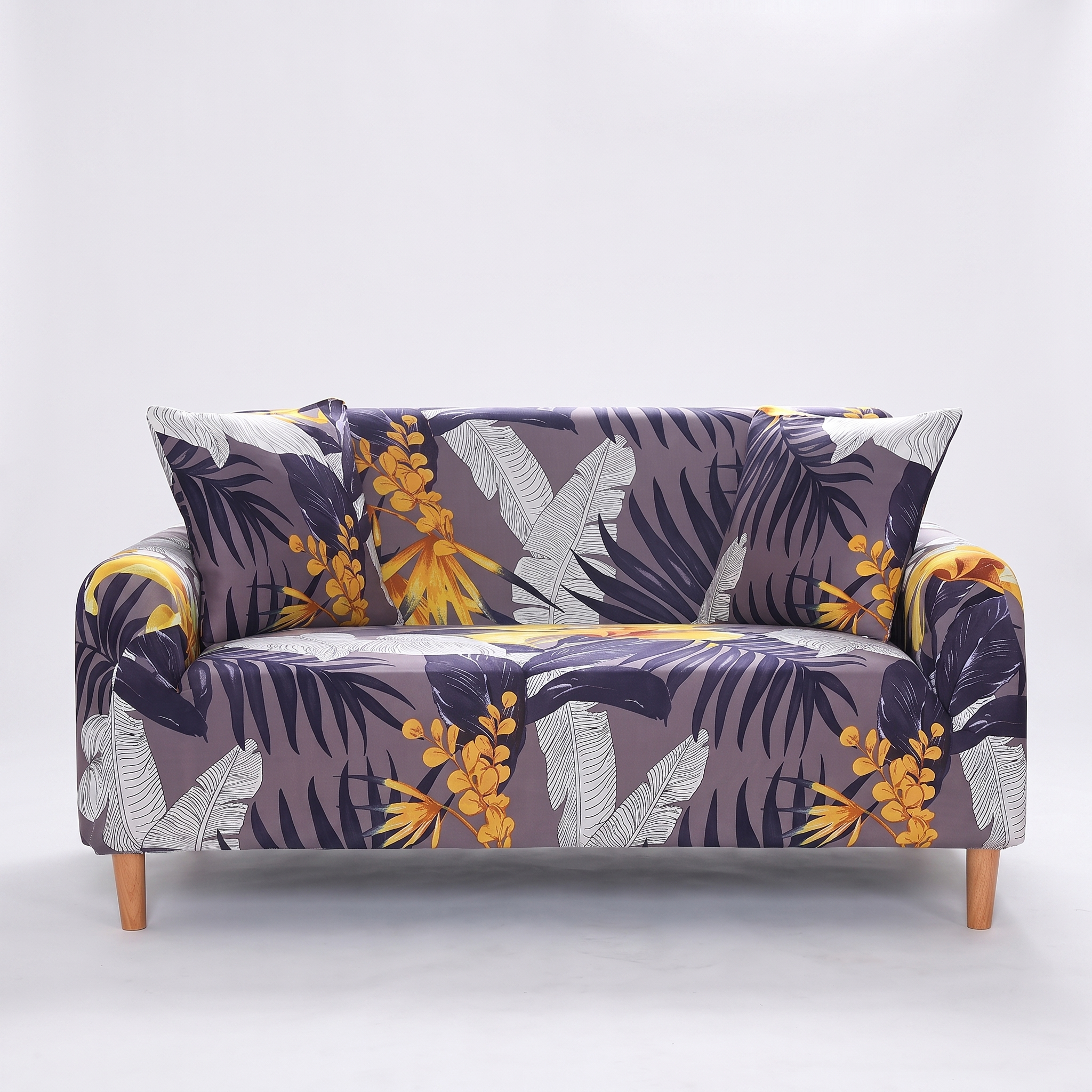 Stretch Sofa Slipcover – Purple Grey Gold Tropical Leaf Print – product photo on a white background | Brivenzo