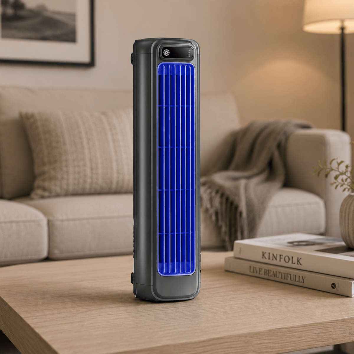 Compact cordless desk fan on a home office desk