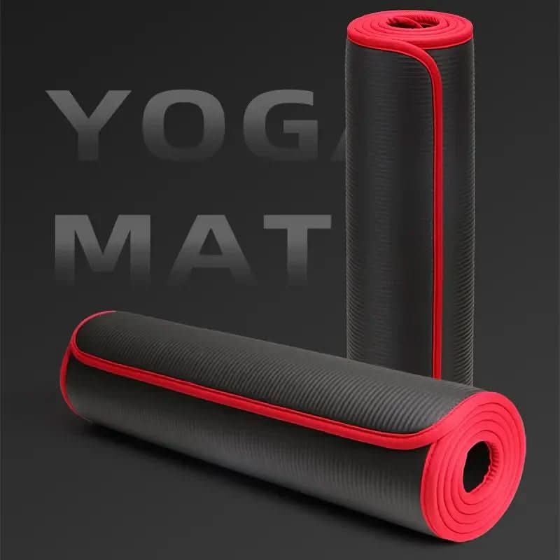 Rolled up yoga mat next to its carrying bag