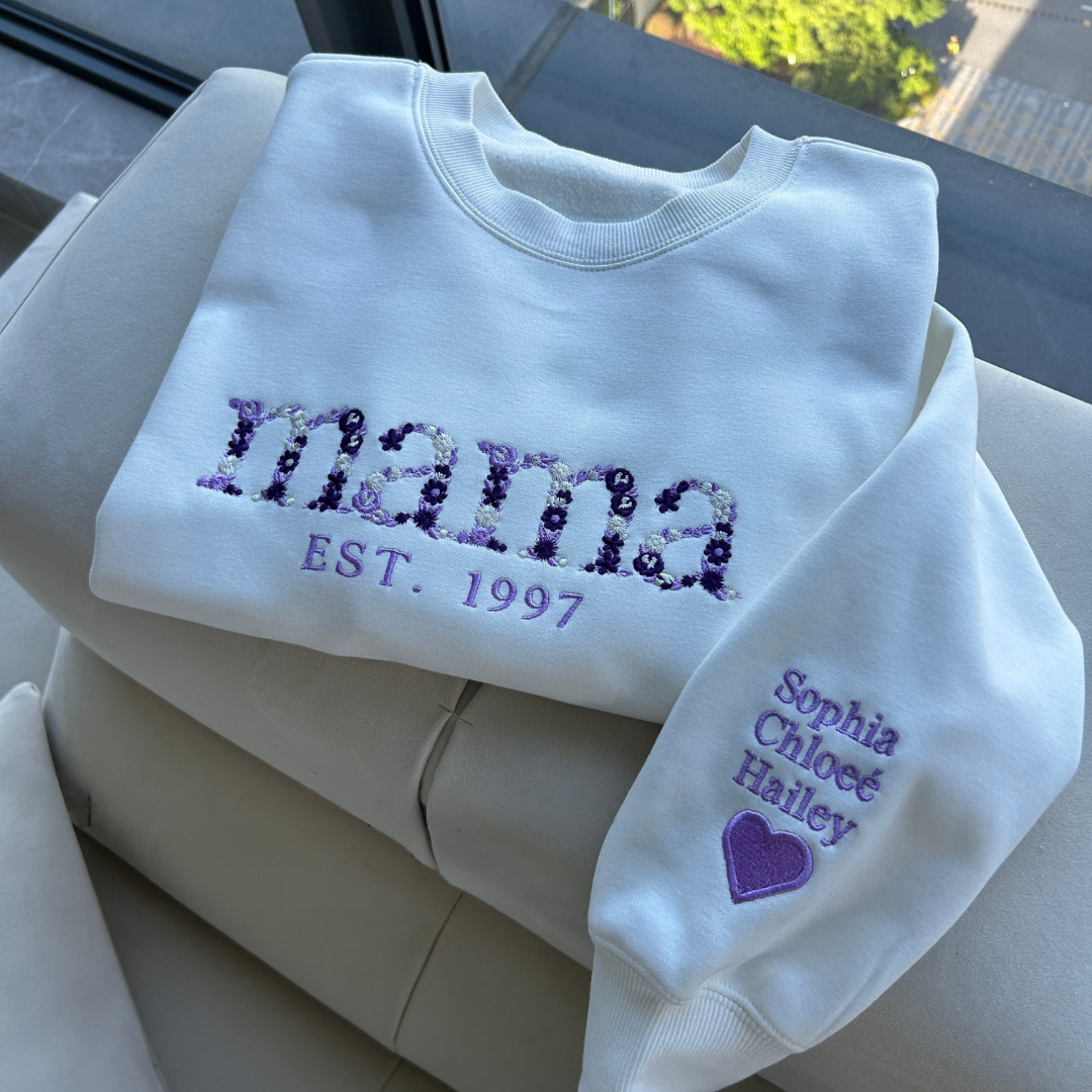 Various color options of the personalized embroidered sweatshirt showing different custom titles like Grandma.
