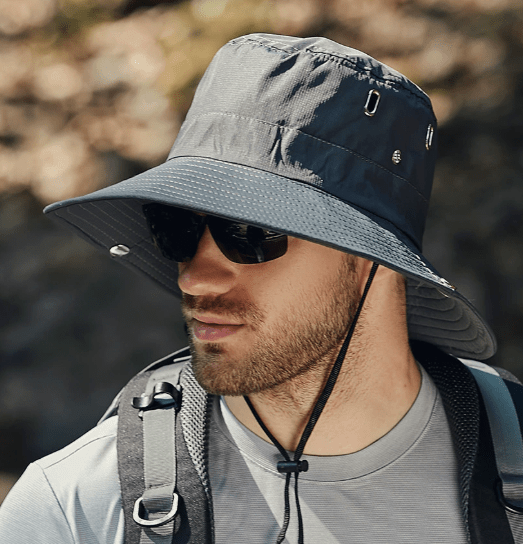 Wide brim sun hat with chin strap worn outdoors