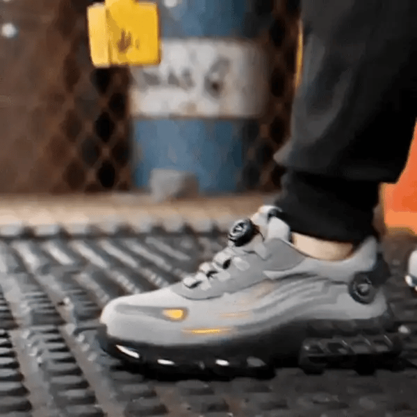 Lightweight gray safety shoes with a wide toe cap