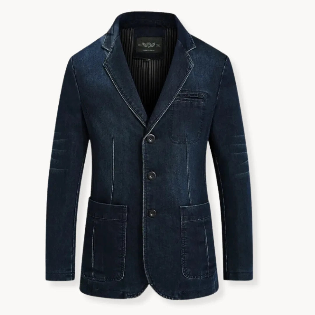 Man wearing a dark blue denim blazer with notch lapels and patch pockets