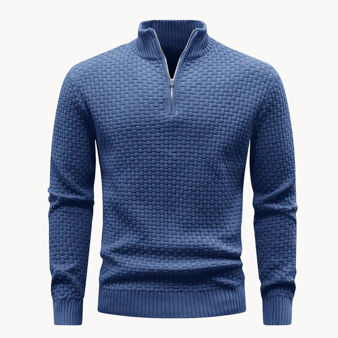 Man wearing a honeycomb knit sweater with a metal zip collar