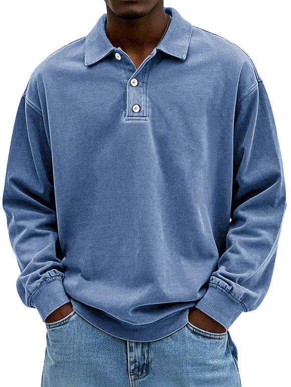 Man wearing a long sleeve polo shirt with button placket