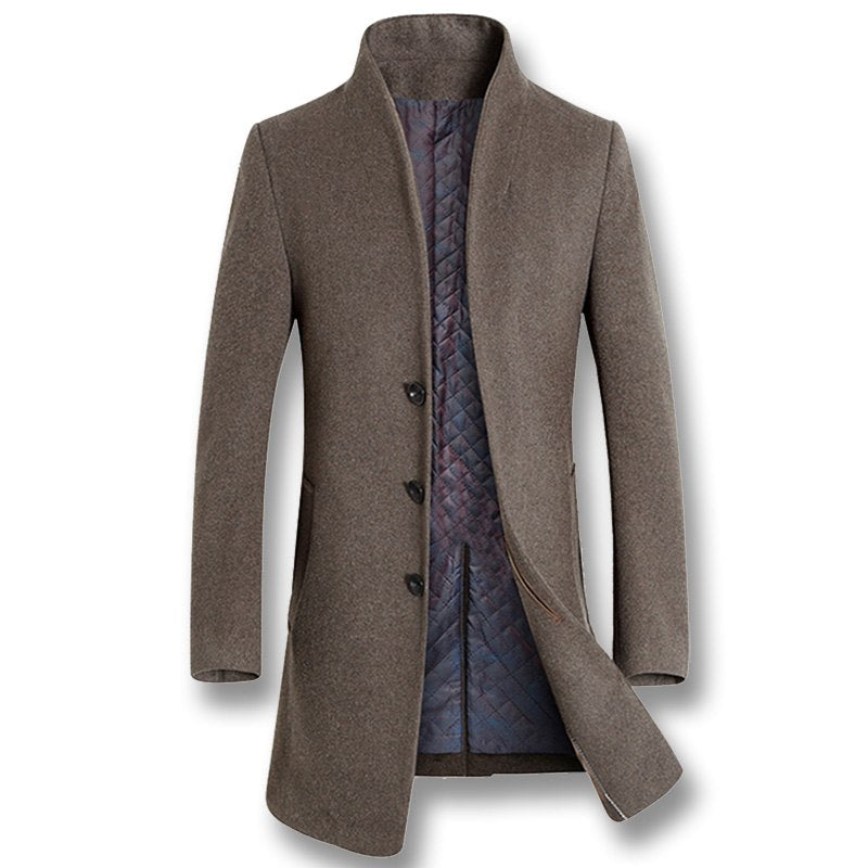 Detail of the buttons and zipper closure on the long wool coat
