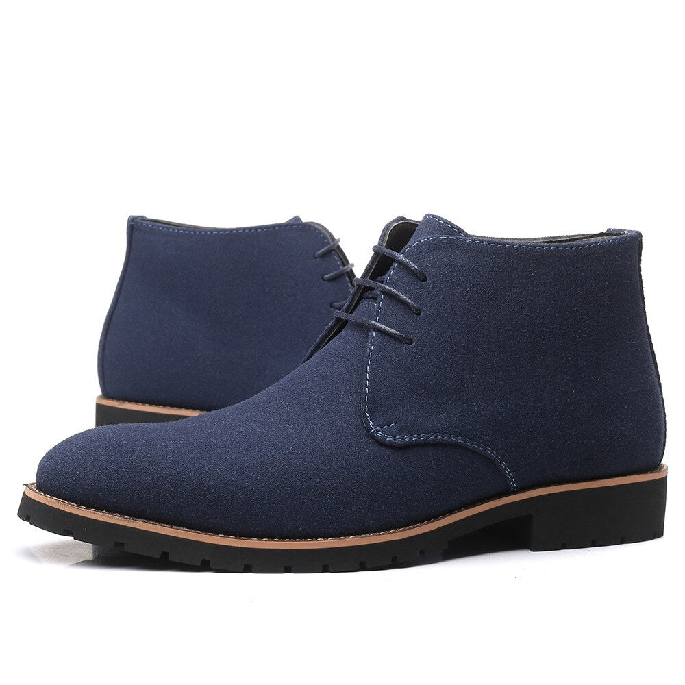 Side view of the low shaft leather ankle boot worn with jeans