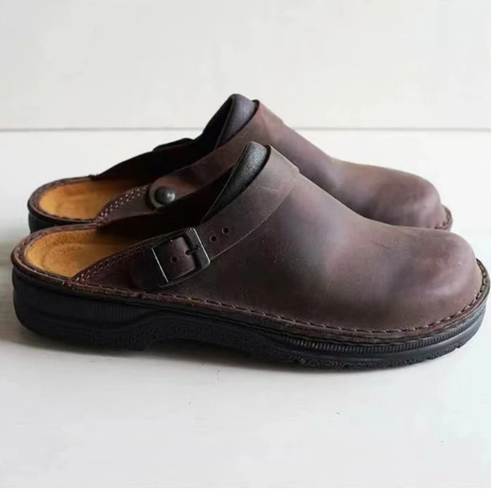 Pair of men's leather slippers with a sturdy outdoor sole