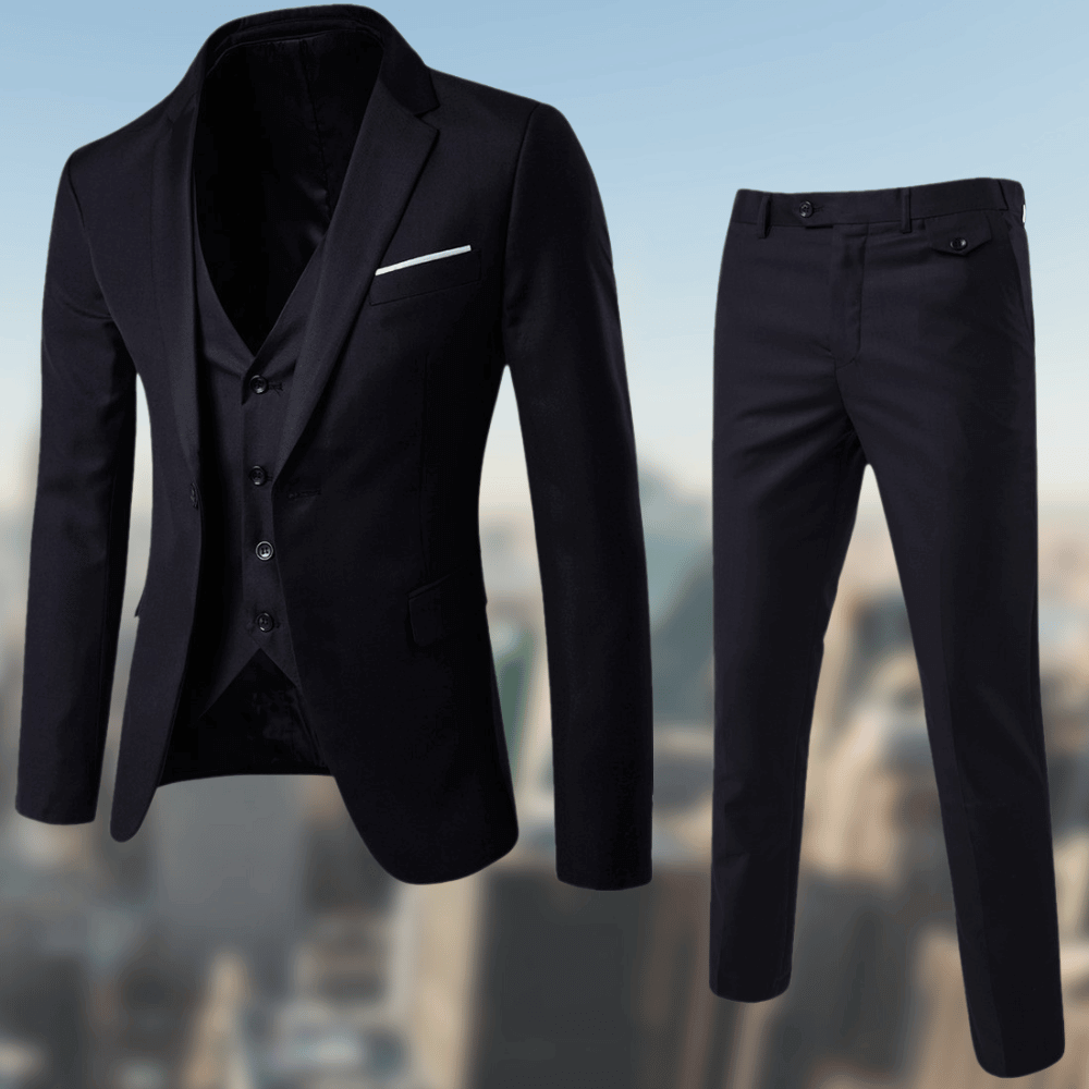 Man wearing a three piece suit with jacket, vest and slim pants