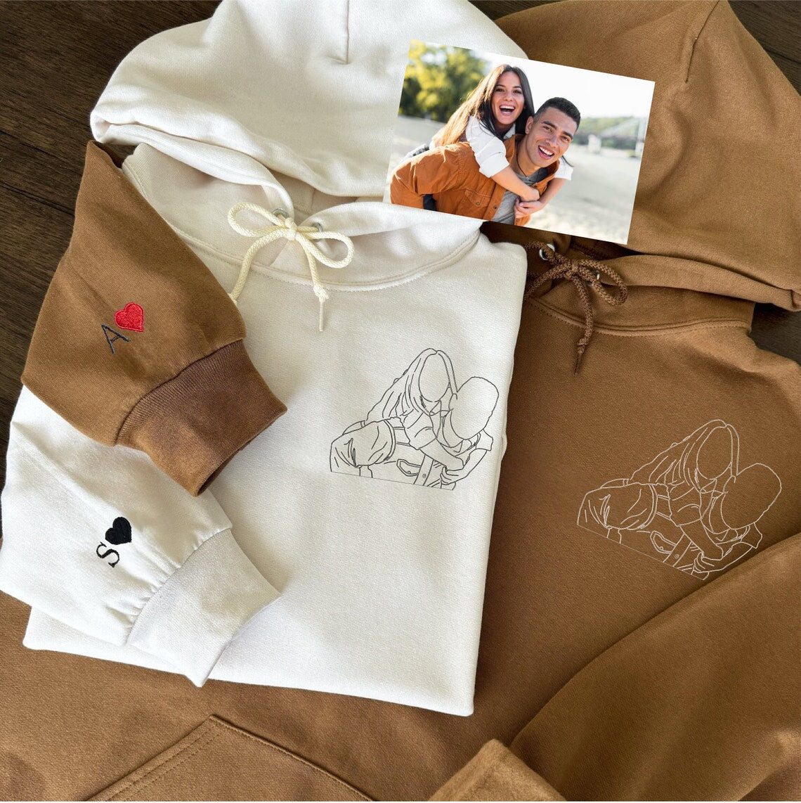 Close-up of high-precision stitching on a custom embroidered sweatshirt showing the clean thread details of a photo.