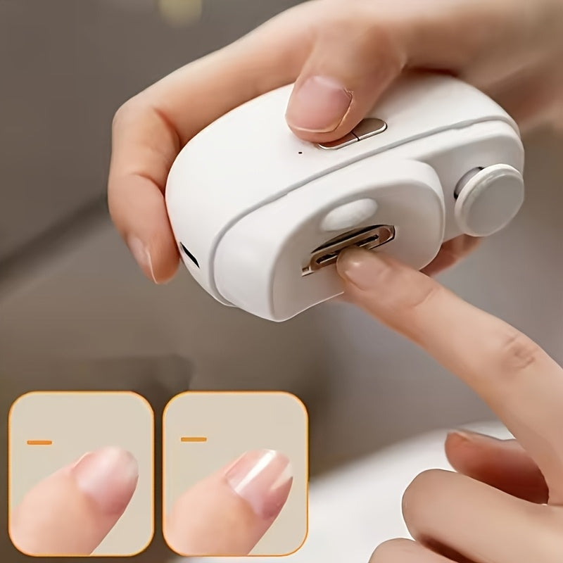 A person gently trimming their fingernails using the electric nail clipper with the built-in LED light on.