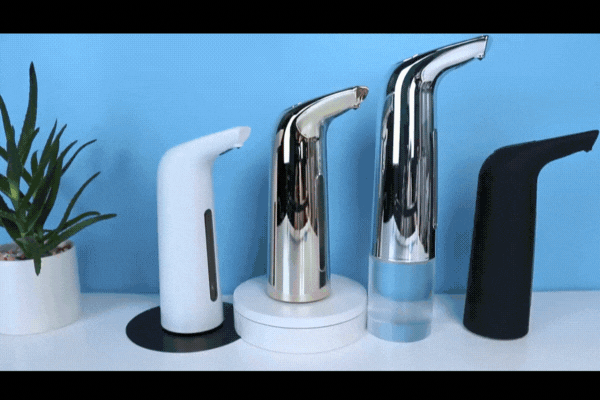 Automatic soap dispenser dispensing soap onto a hand