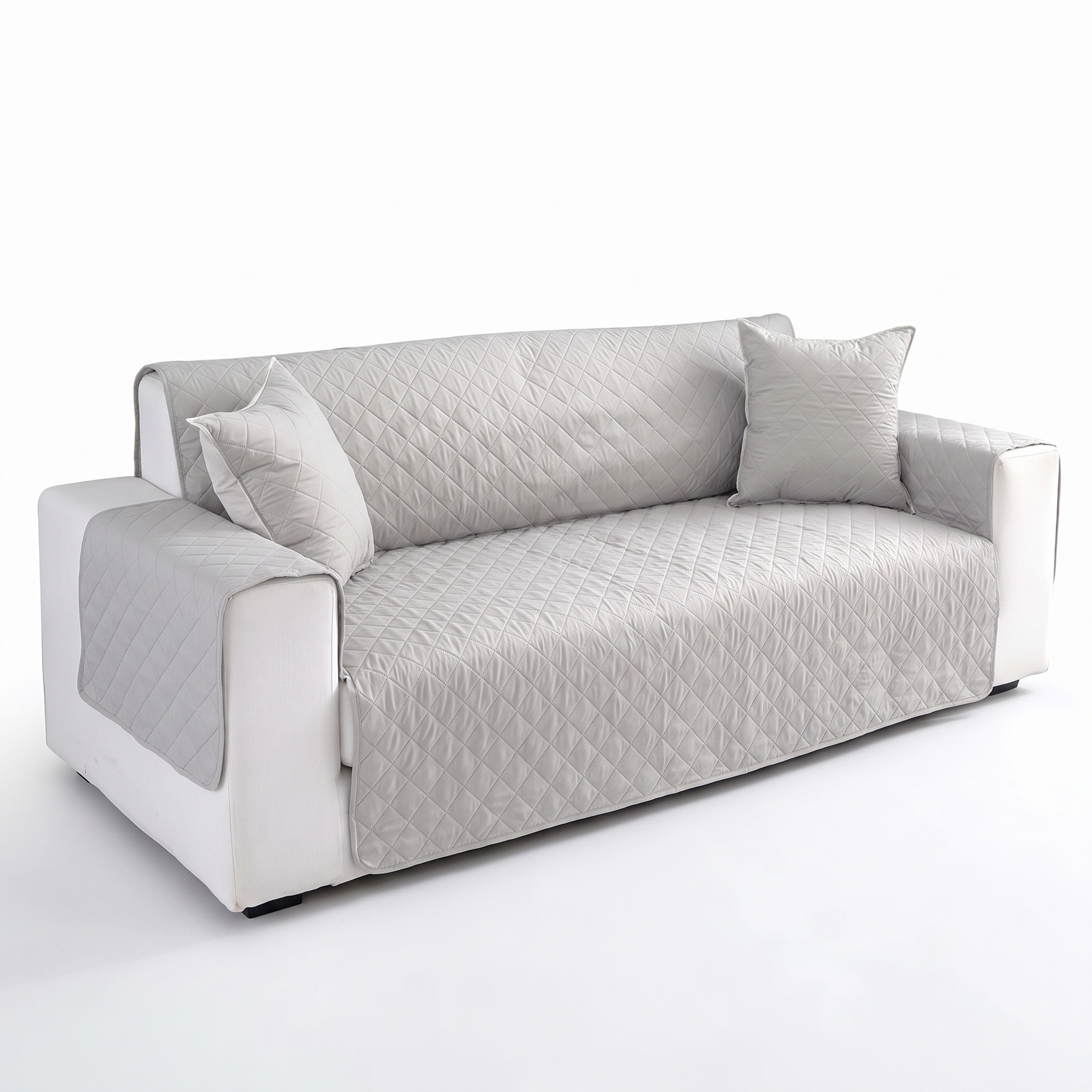 Light grey waterproof quilted sofa cover, studio product photo
