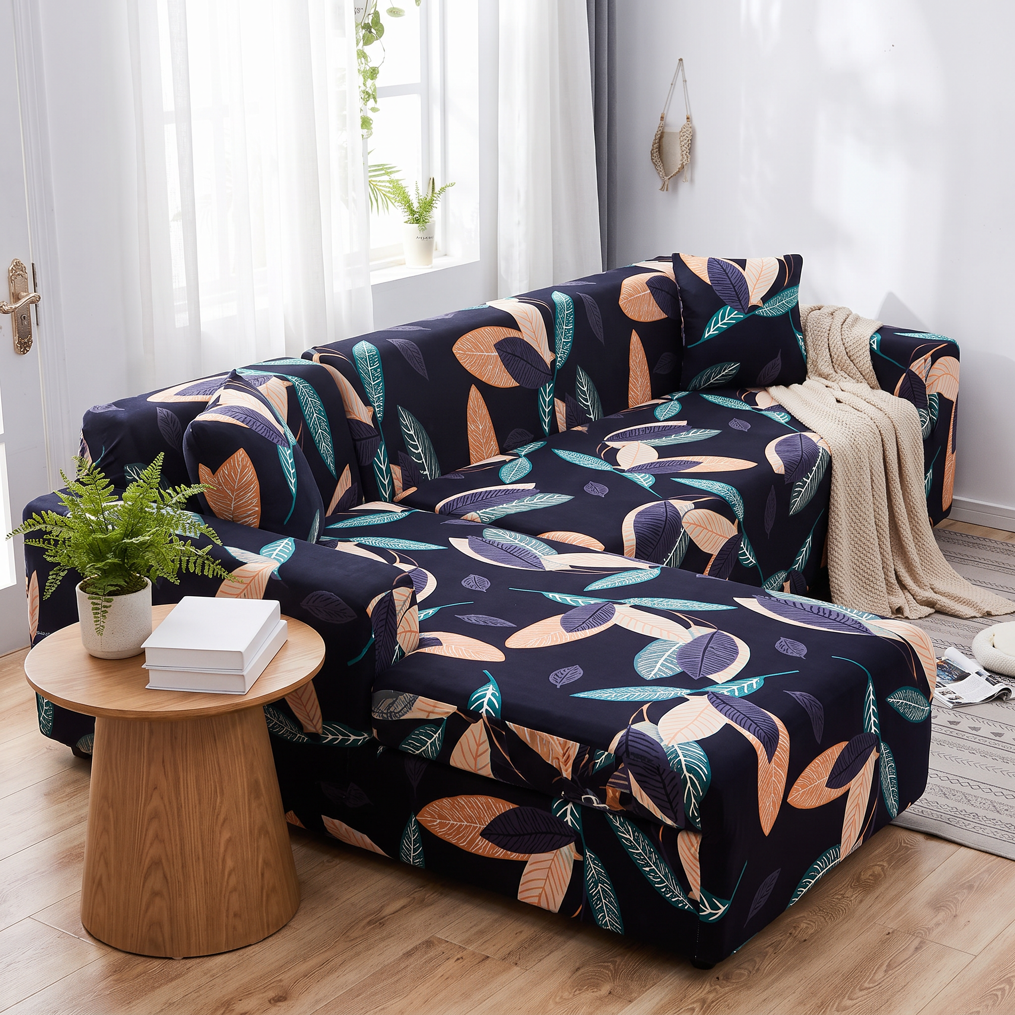 Stretch Sectional Couch Cover – Black Autumn Leaf Print shown in a styled home interior | Brivenzo