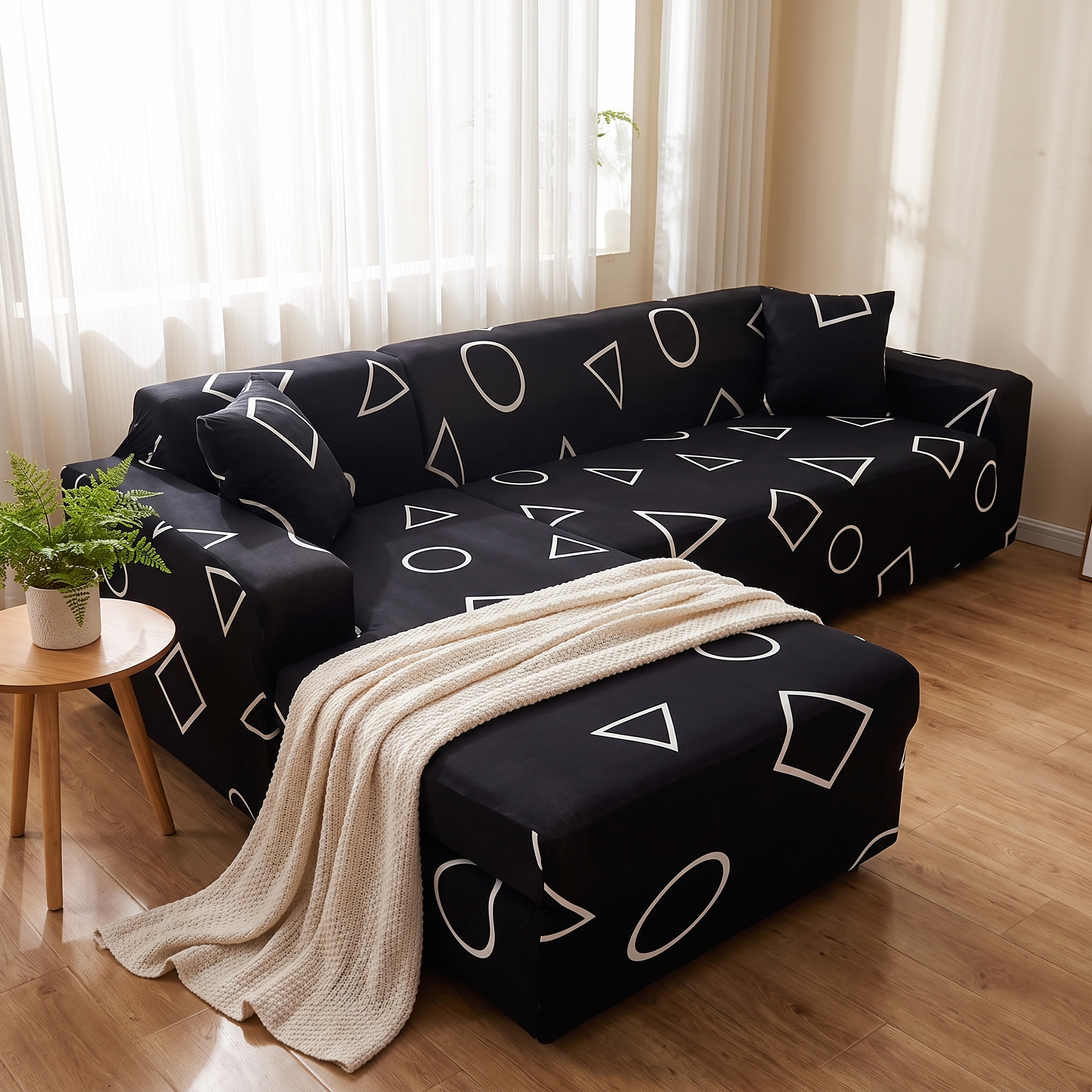 Stretch Sectional Couch Cover – Black Geometric Shapes Print shown in a styled home interior | Brivenzo