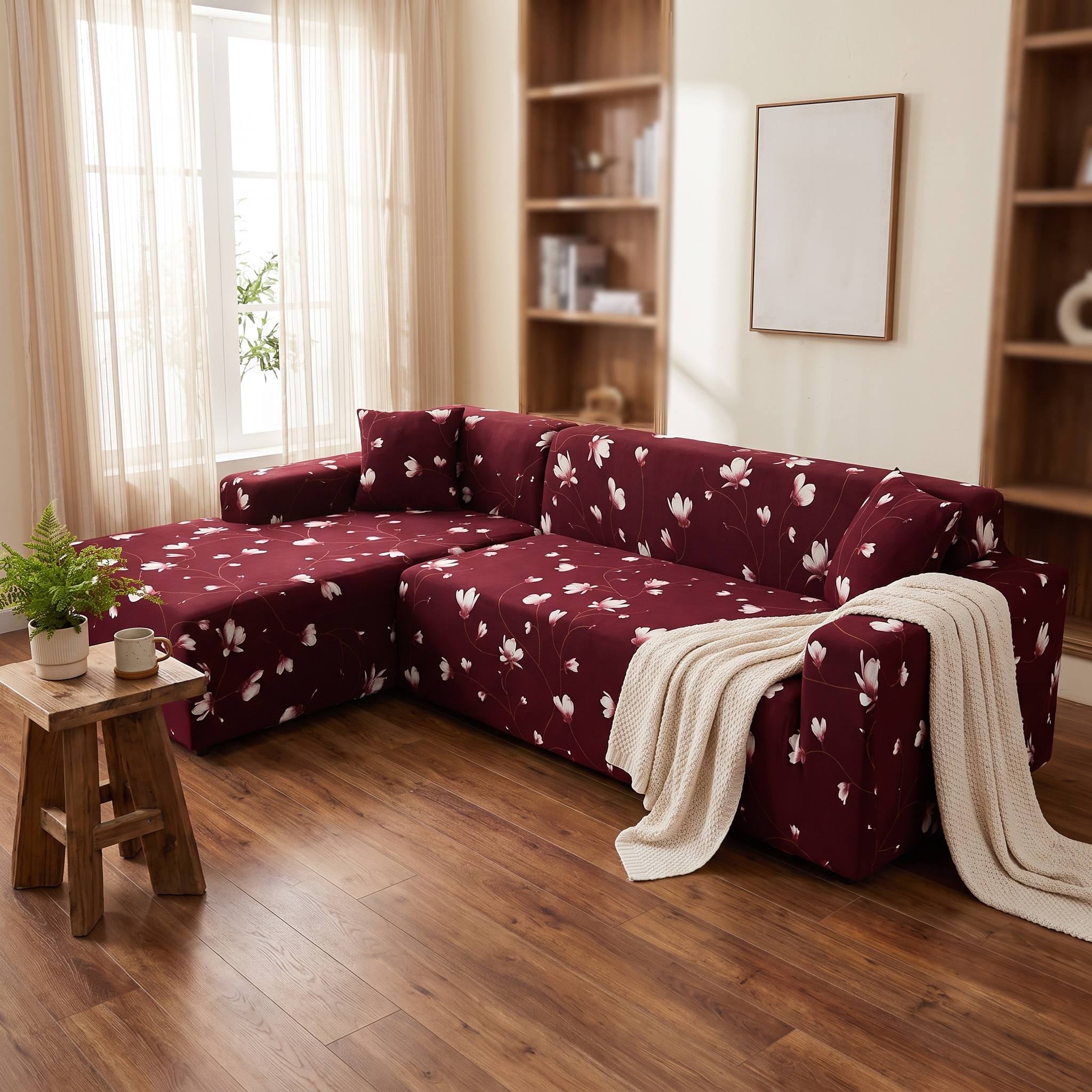 Stretch Sectional Couch Cover – Burgundy Floral Magnolia Print shown in a styled home interior | Brivenzo