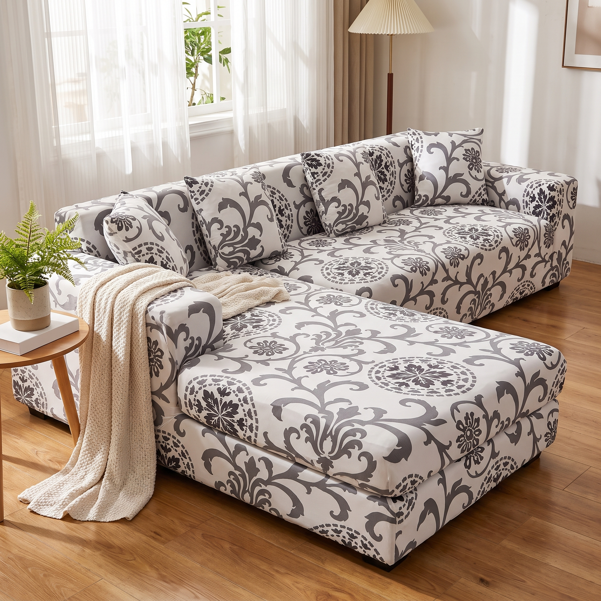 Stretch Sectional Couch Cover – Grey Floral Scroll Print shown in a styled home interior | Brivenzo