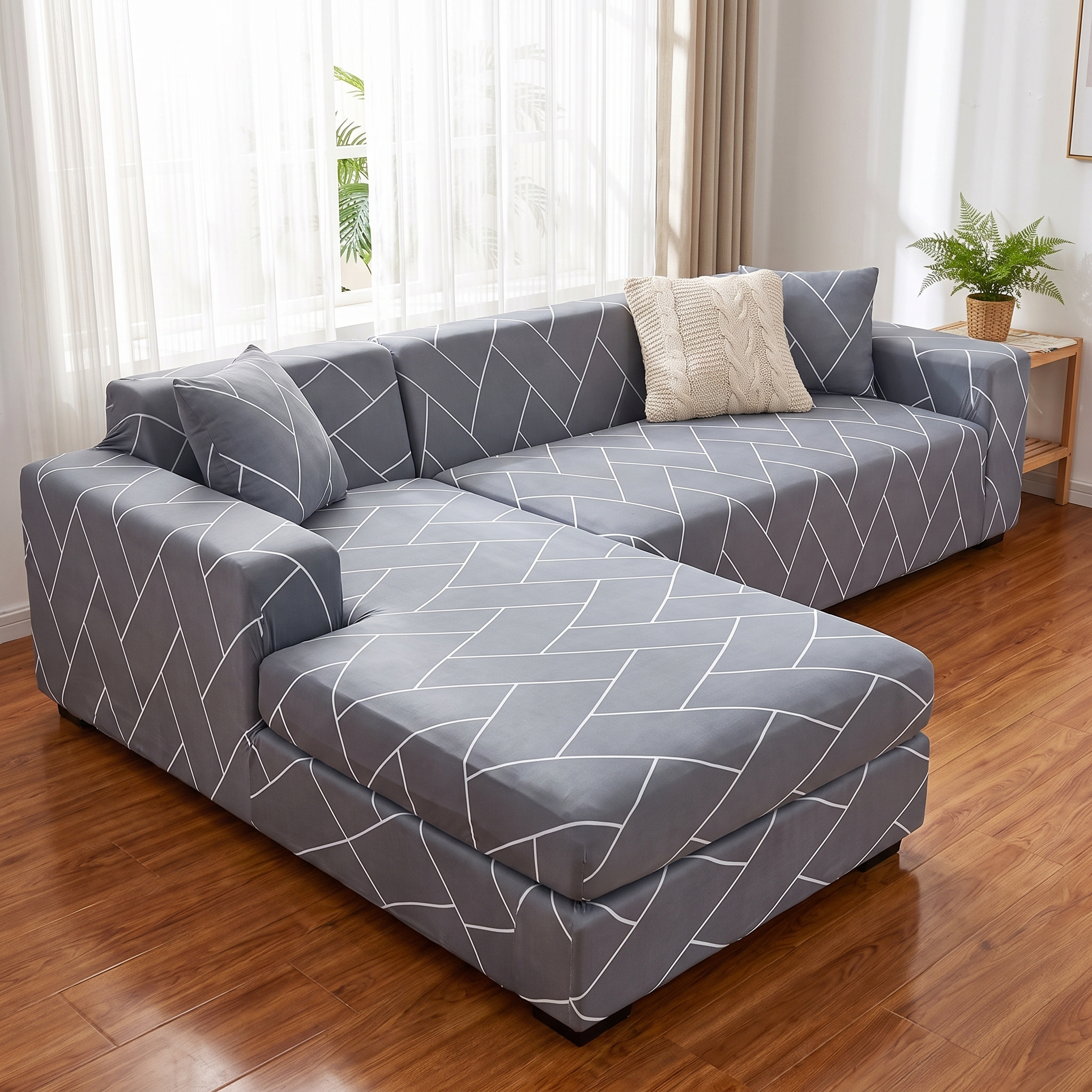 Stretch Sectional Couch Cover – Grey Herringbone Weave Print shown in a styled home interior | Brivenzo