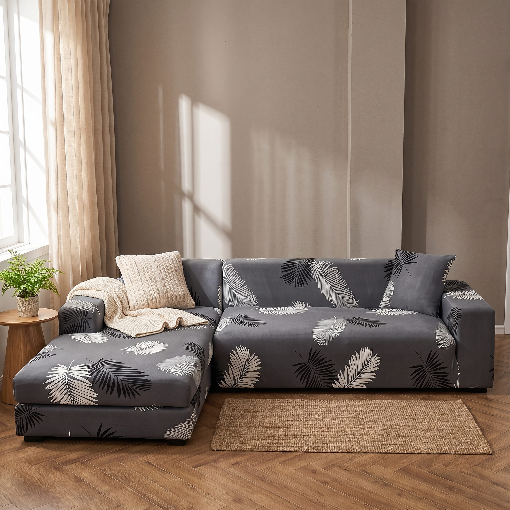 Stretch Sectional Couch Cover – Grey Multitone Palm Leaf Print shown in a styled home interior | Brivenzo