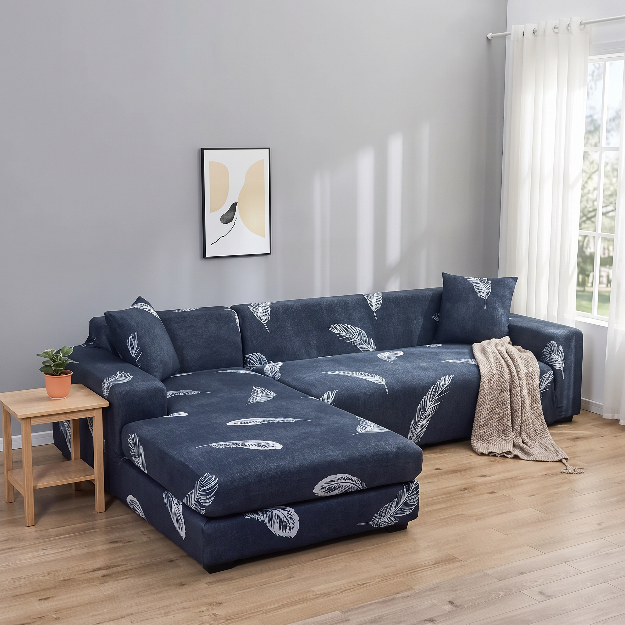Stretch Sectional Couch Cover – Navy Feather Print shown in a styled home interior | Brivenzo