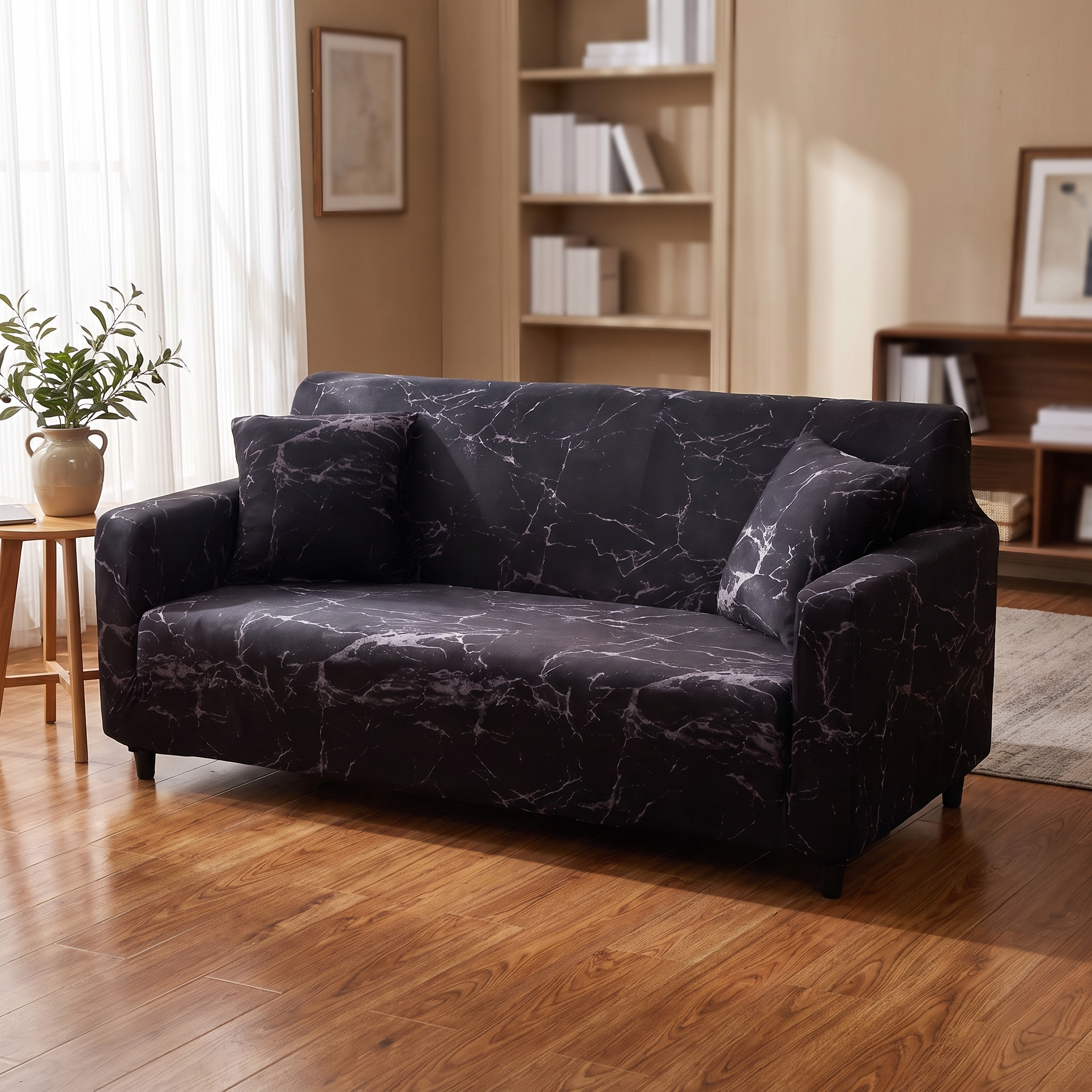 Stretch Sofa Slipcover – Black Marble Print shown in a styled home interior | Brivenzo