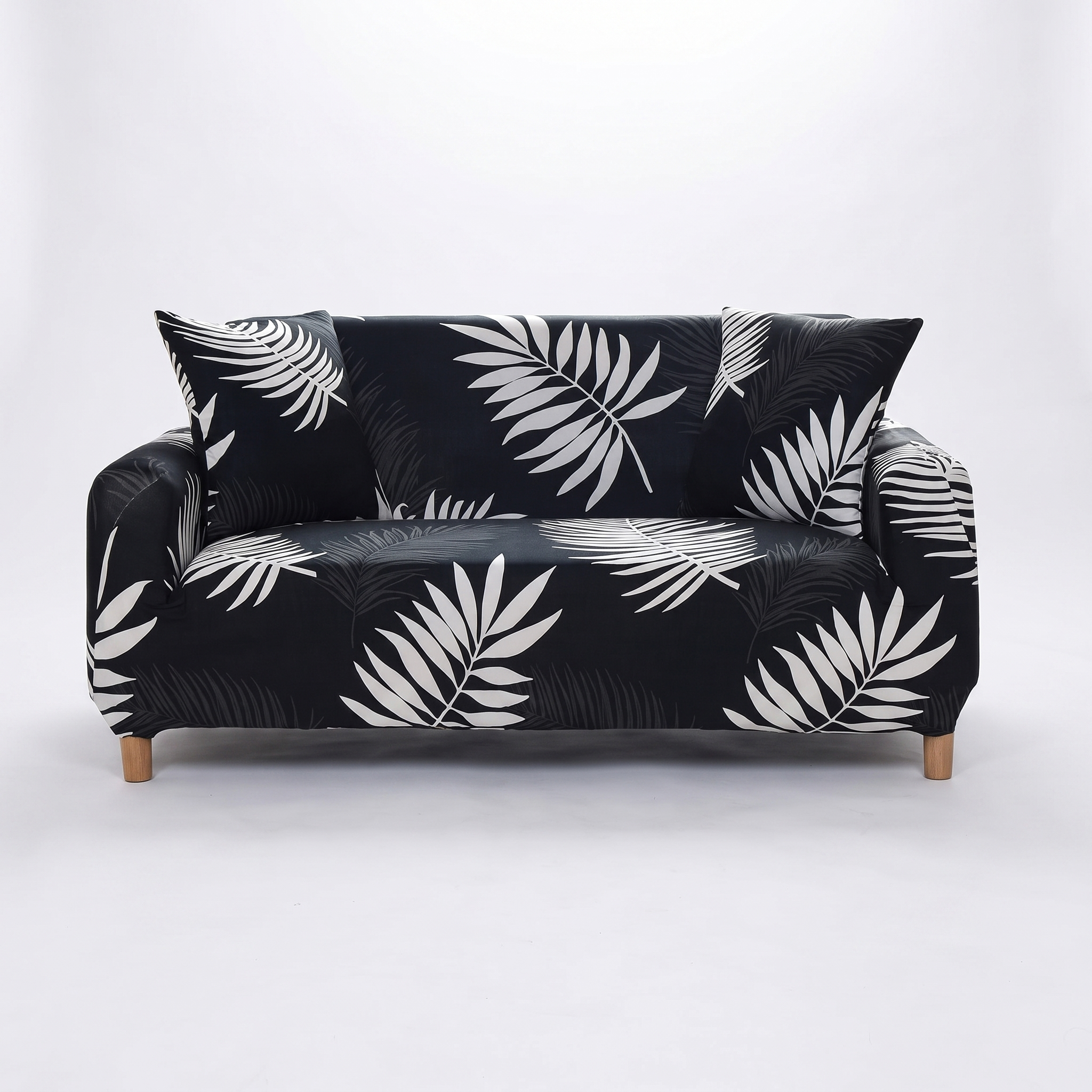 Stretch Sofa Slipcover – Black White Palm Leaf Print – product photo on a white background | Brivenzo