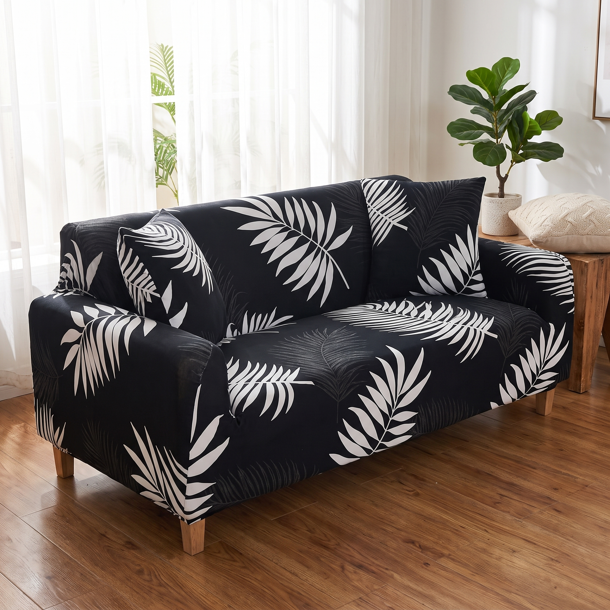 Stretch Sofa Slipcover – Black White Palm Leaf Print shown in a styled home interior | Brivenzo