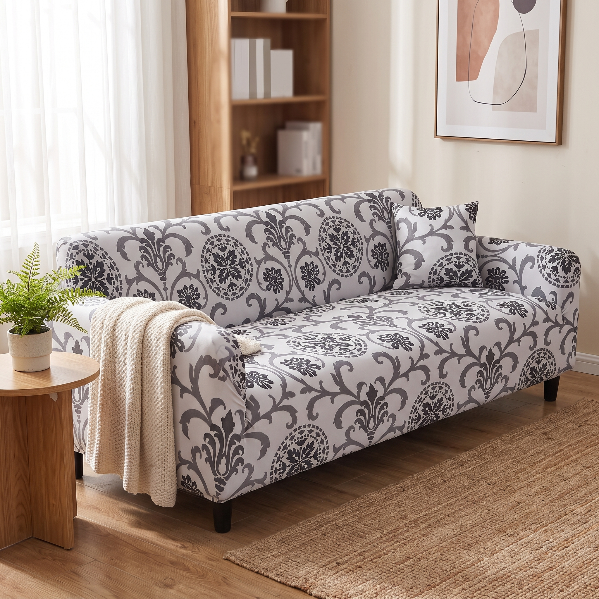 Stretch Sofa Slipcover – Grey Black Damask Print shown in a styled home interior | Brivenzo