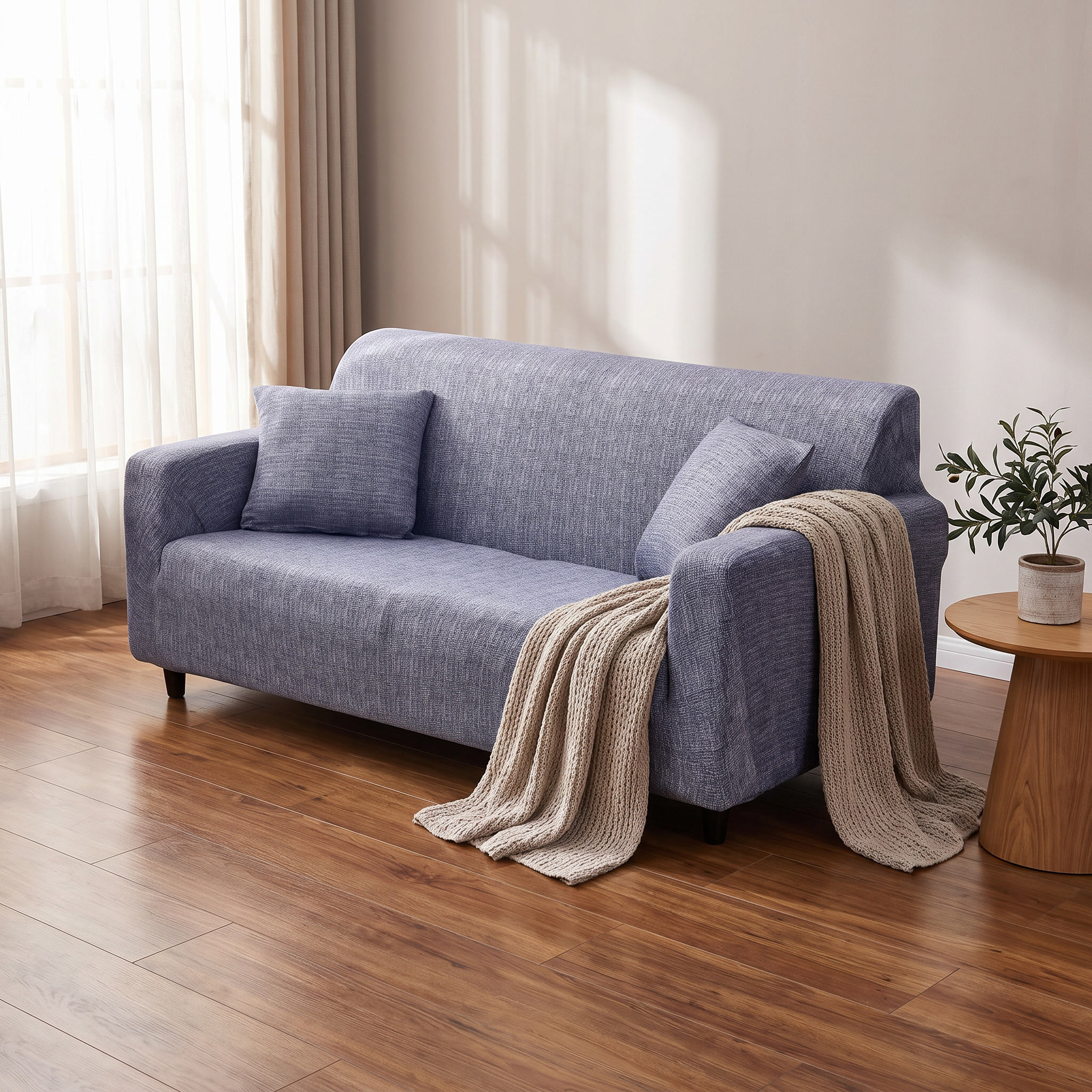 Stretch Sofa Slipcover – Slate Blue Herringbone Print shown in a styled home interior | Brivenzo