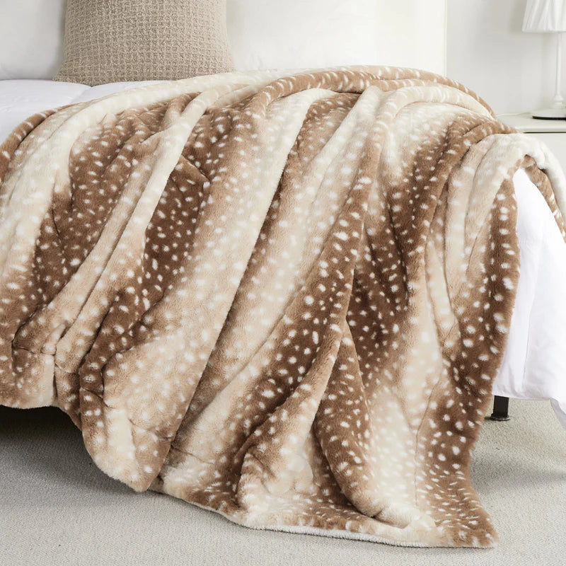 Close-up of the soft double sided plush and deer pattern