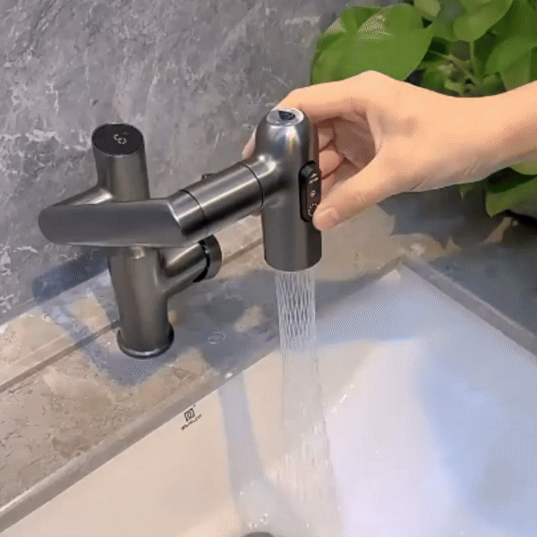 Height adjustable kitchen faucet with temperature display over a double sink