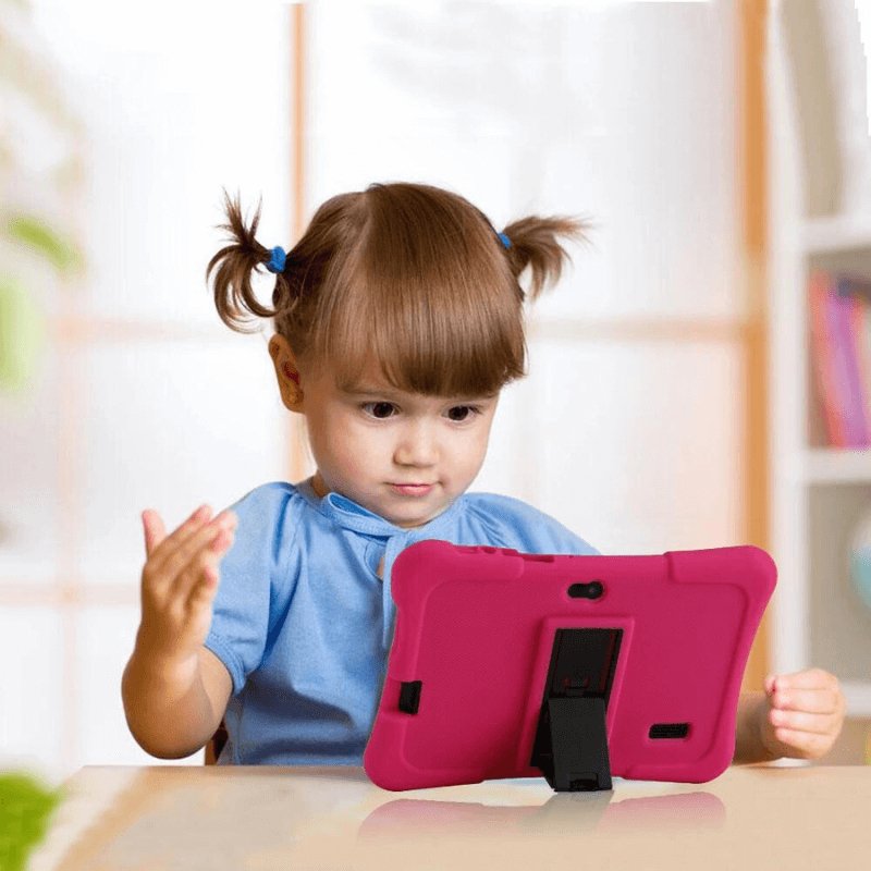 Child holding a kids learning tablet with a 7 inch screen