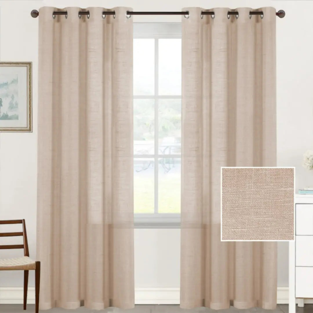 Linen jacquard shower curtain with tassel trim hanging in a bathroom