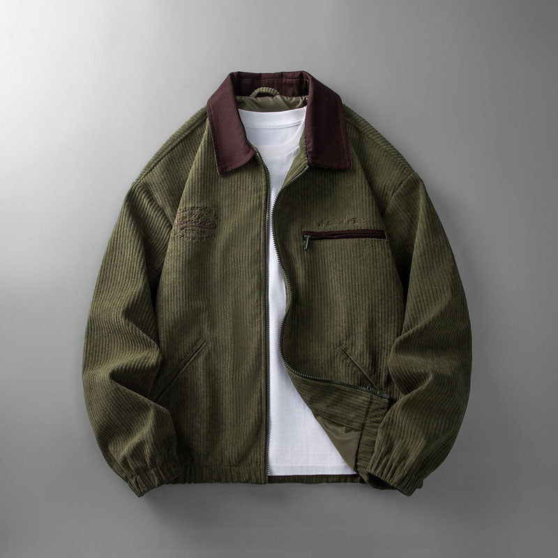 Detail of the zippered chest pocket on the corduroy jacket