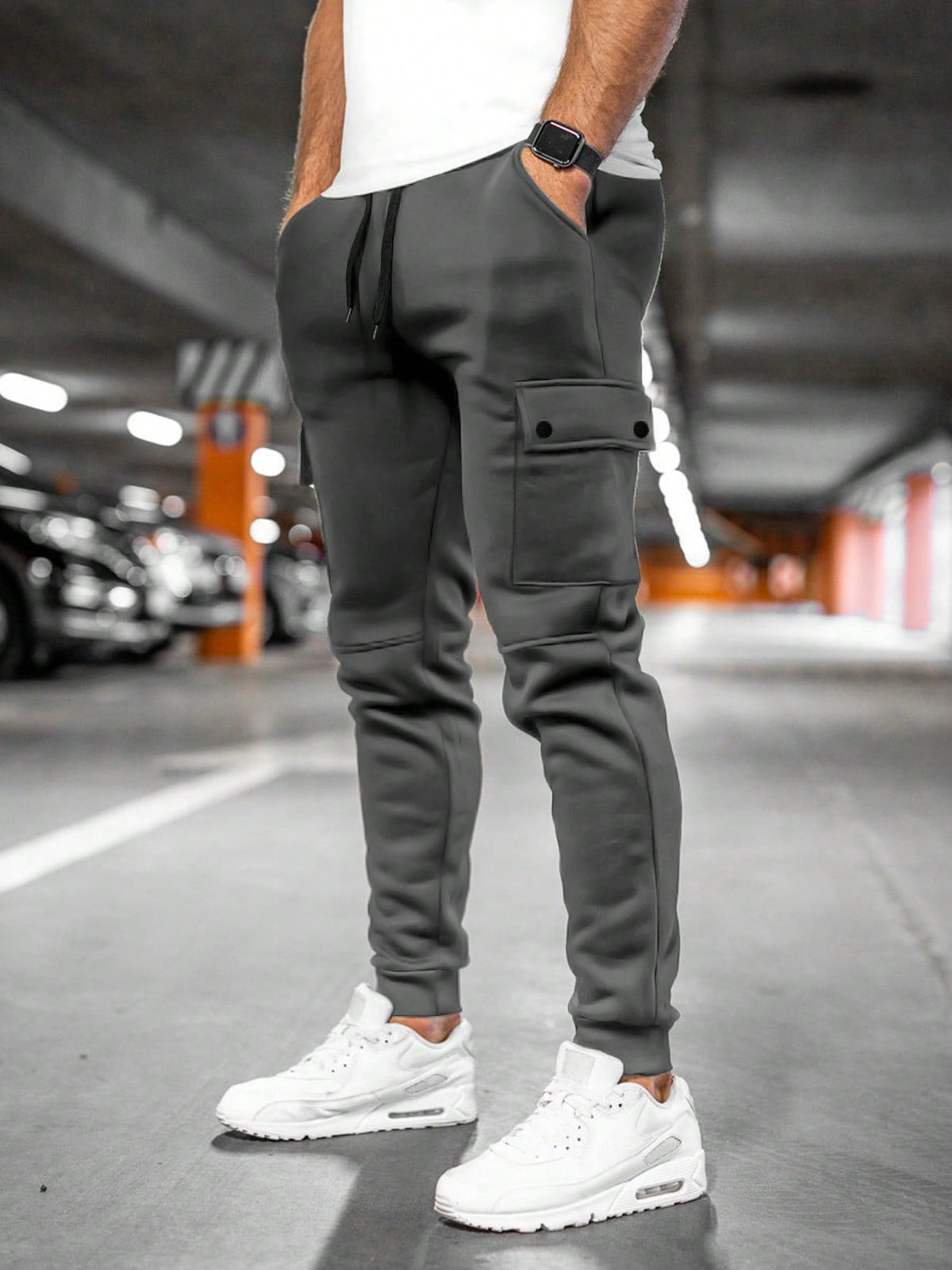 Man wearing cropped sweatpants that end above the ankle