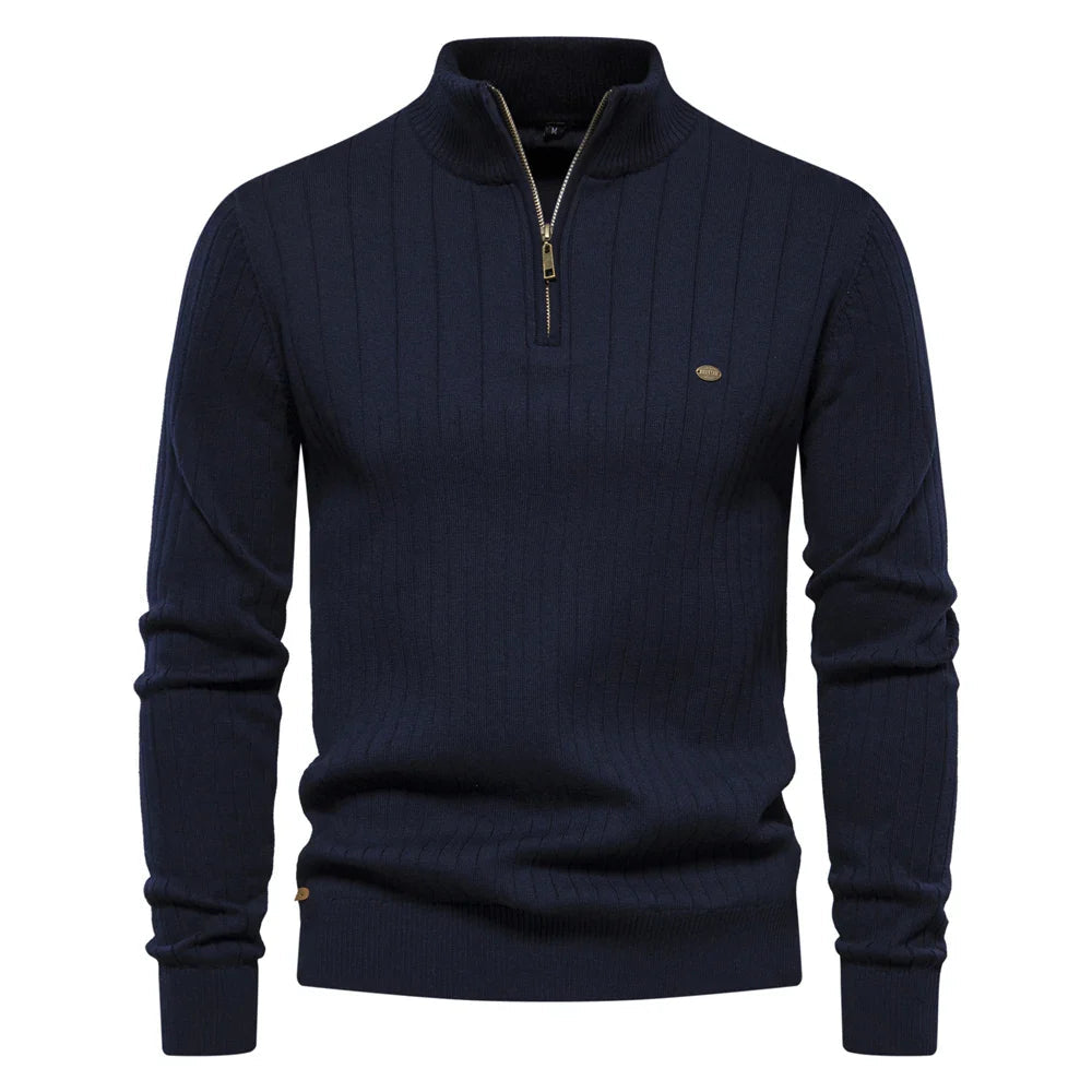 Man wearing a cotton blend zip sweater with a high stand collar