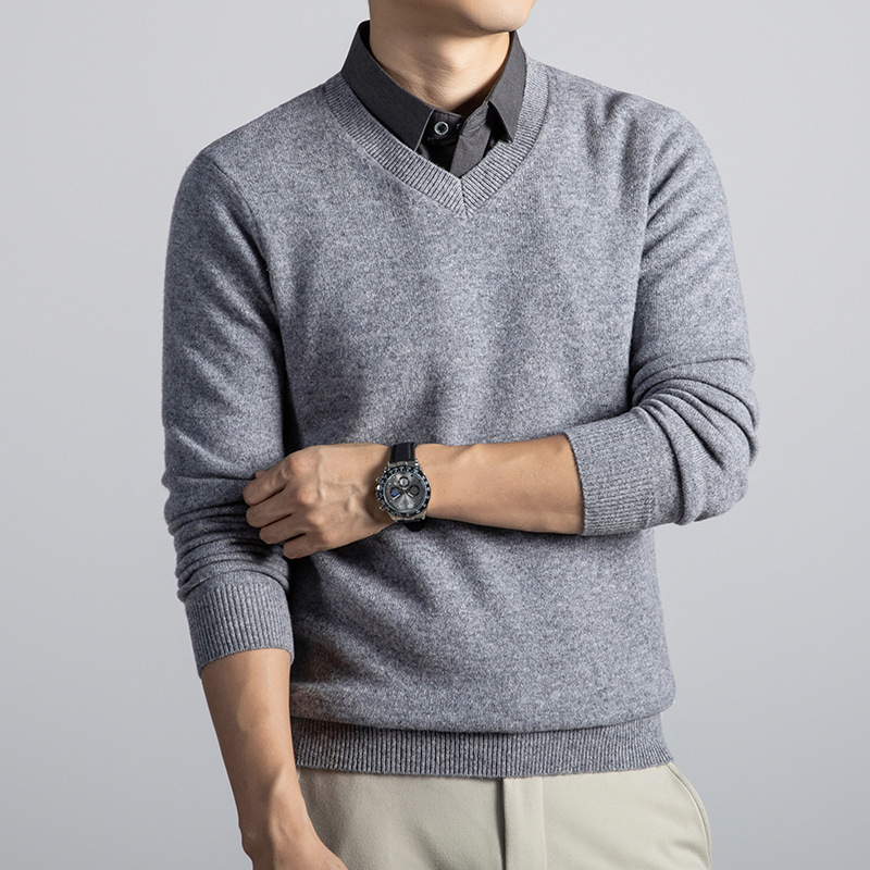 Man wearing a soft knit V neck sweater over a dress shirt