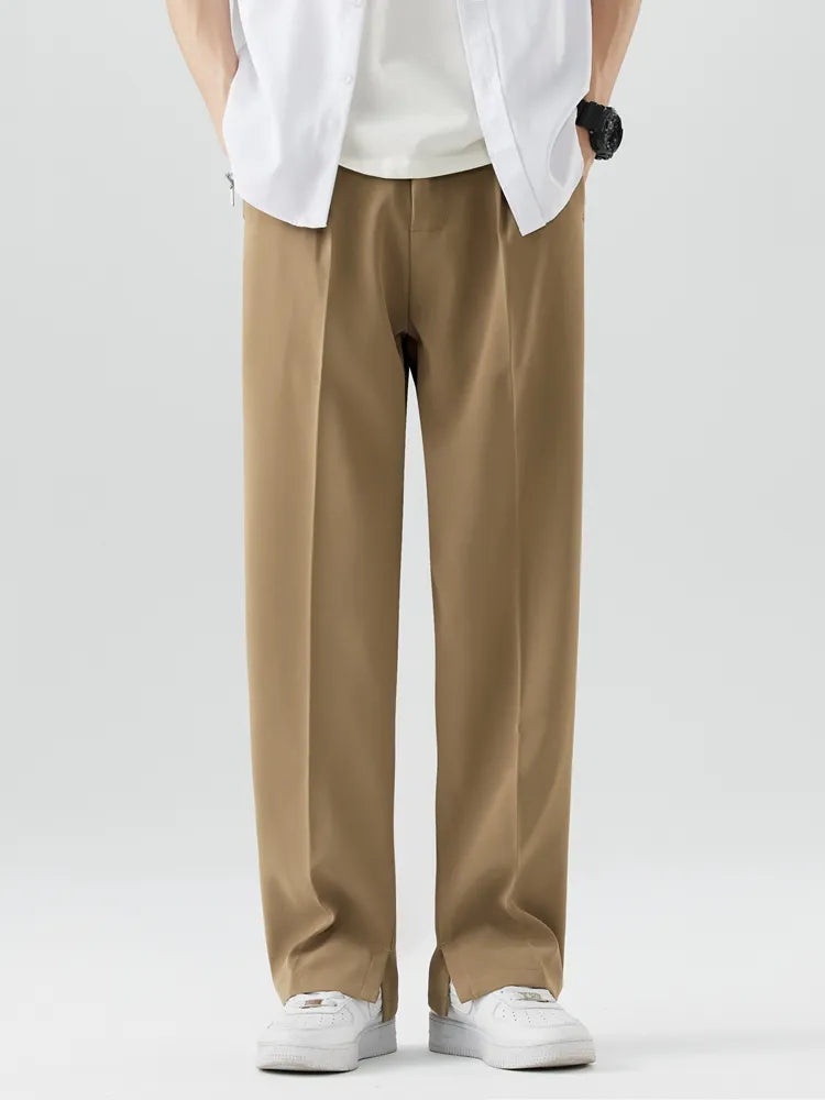 Man wearing straight leg cotton blend pants with a shirt