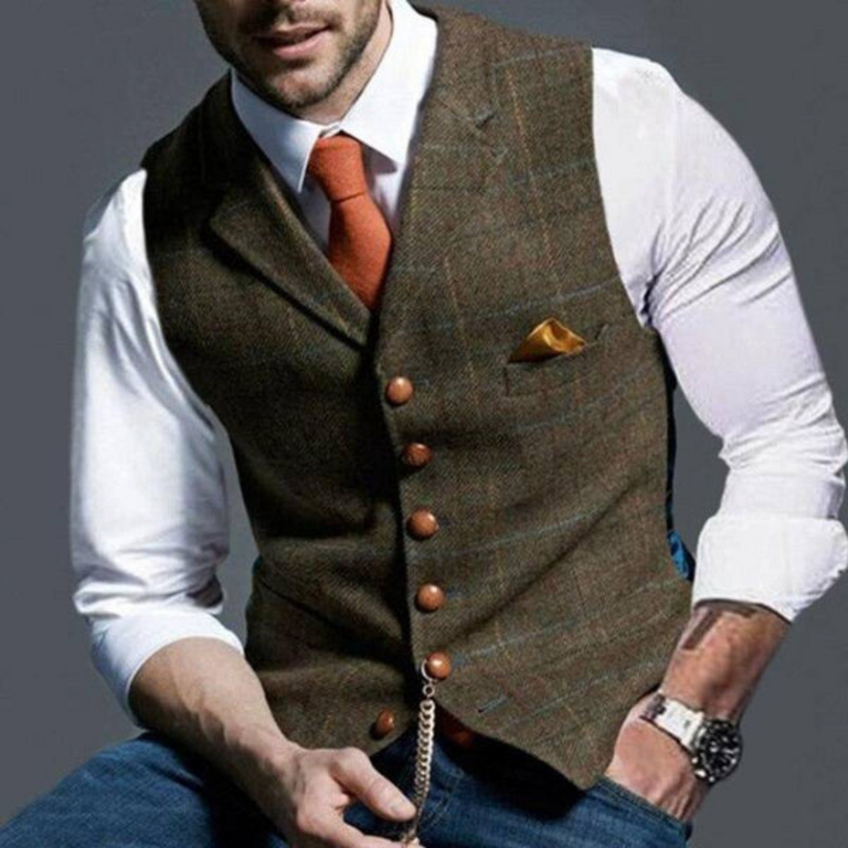 Man wearing a fine check vest over a white dress shirt