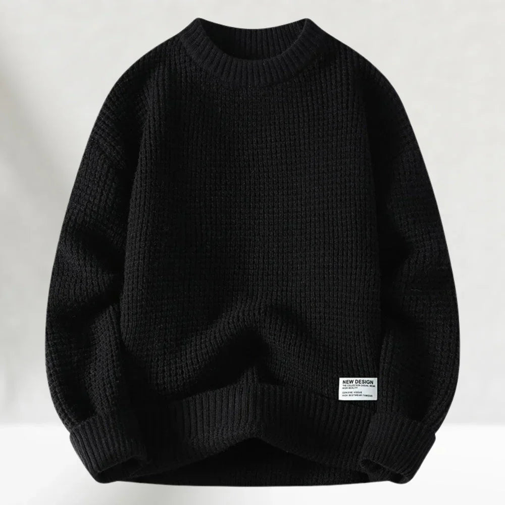 Man wearing a waffle knit crew neck sweater