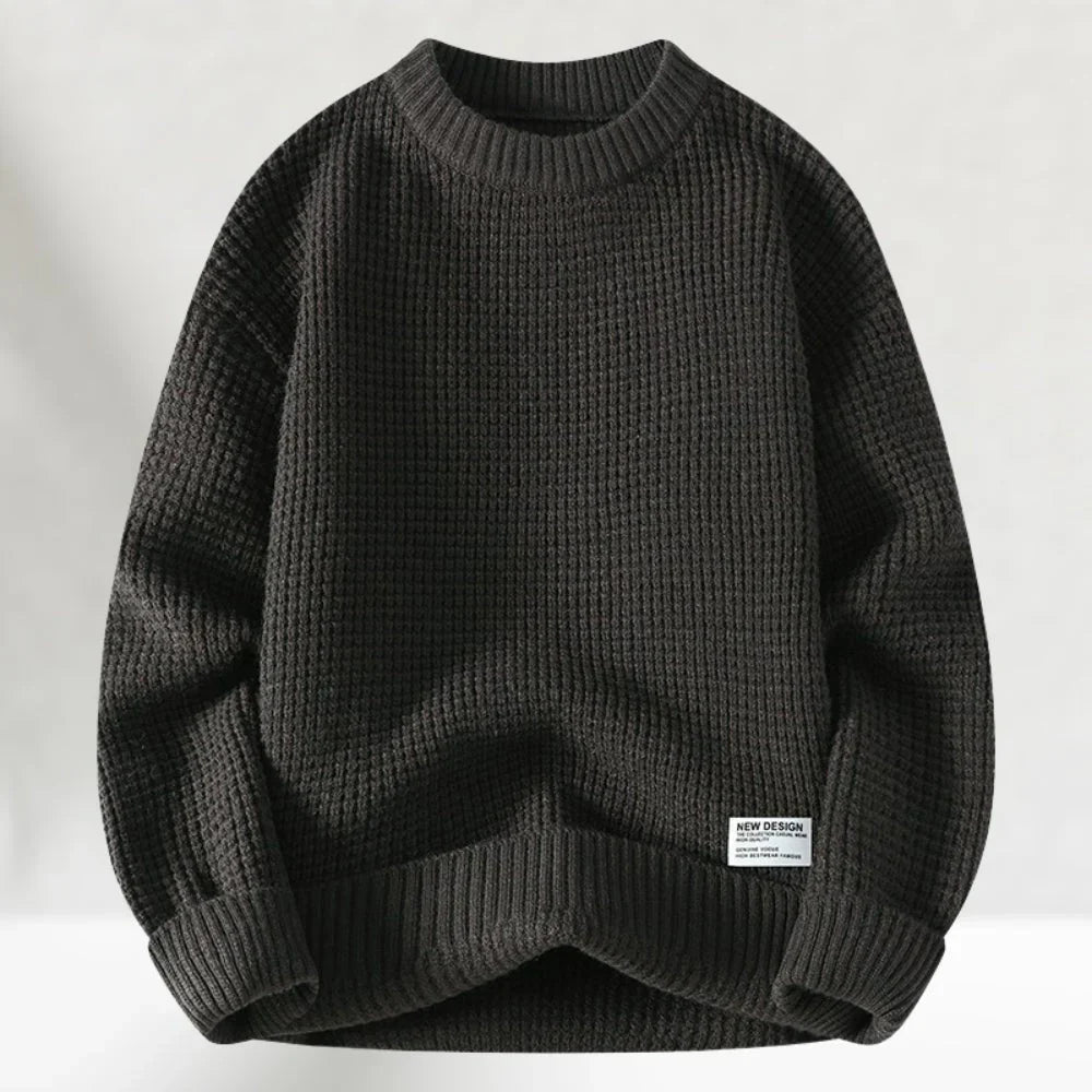 Close-up of the textured waffle knit on a men's sweater