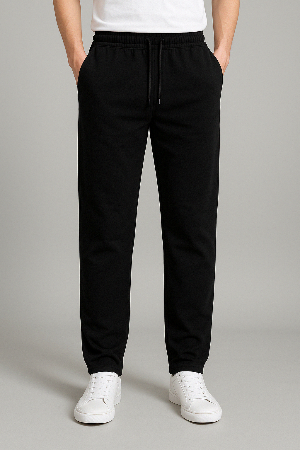 Man wearing wide leg cotton sweatpants with drawstring waist