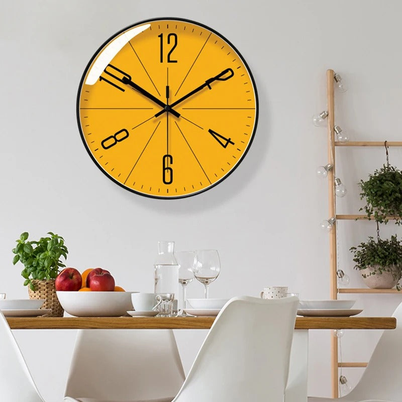Wall clock shown in its four frame and dial color combinations